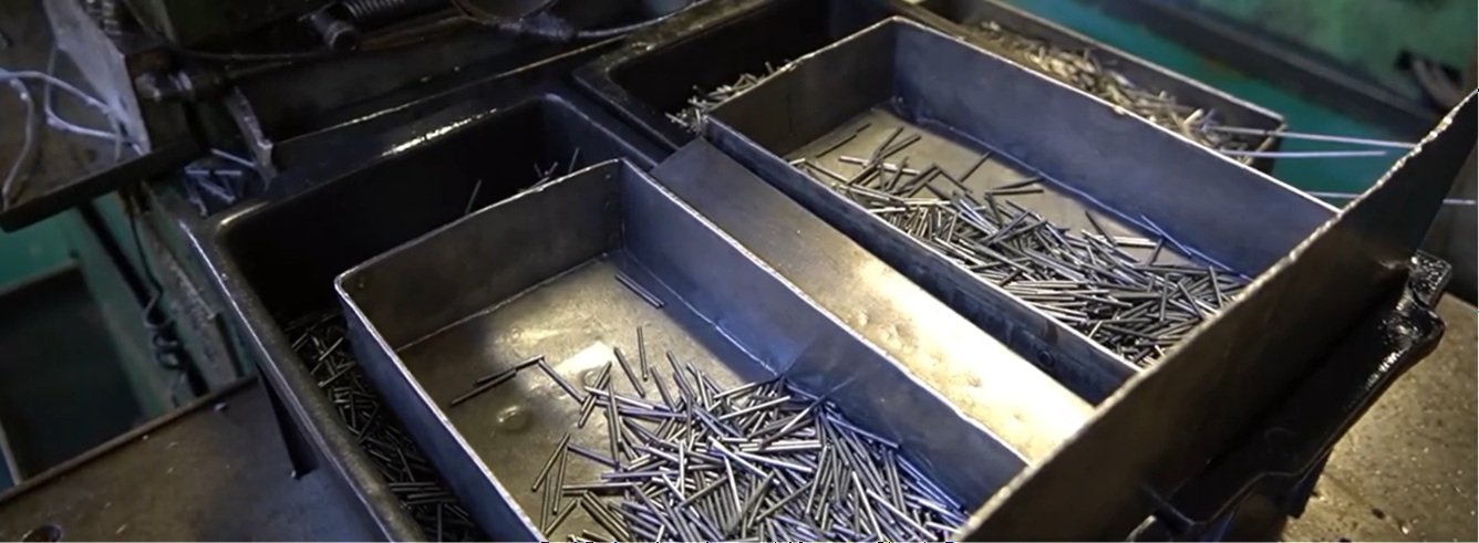 Freshly ground needle blanks sorted in steel trays at the Toshiko workshop